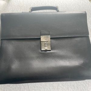 Gucci briefcase. Leather, good condition.